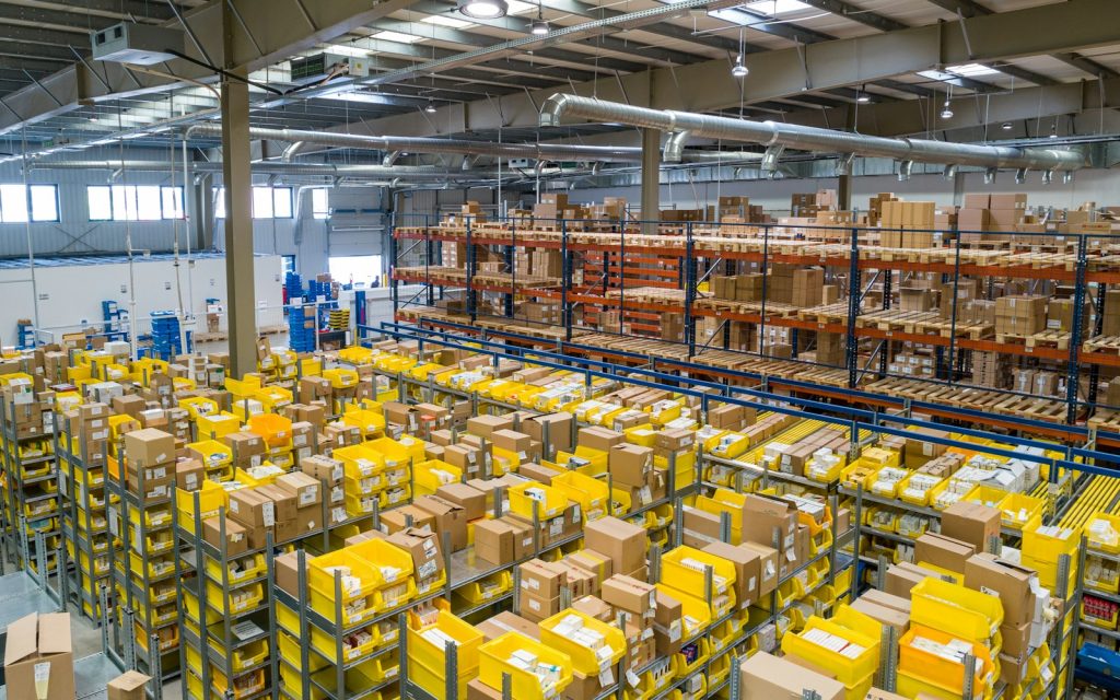 Warehouse aisles stacked with boxed inventory
