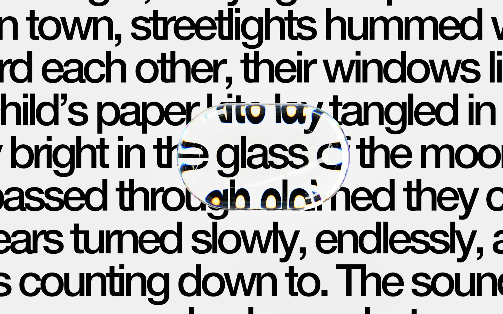 A magnifying glass distorting a block of printed text